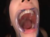 Japanese BDSM cumshot in wide open mouth