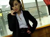 Tiffany Doll is a chic gorgeous business executive bored in her office