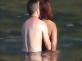 Horny Couple Having Some Fun In The Water At The Beach