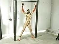 Punishment of Blonde Slave Restrained in Harness and Ropes