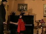 Vintage girl caned on the piano